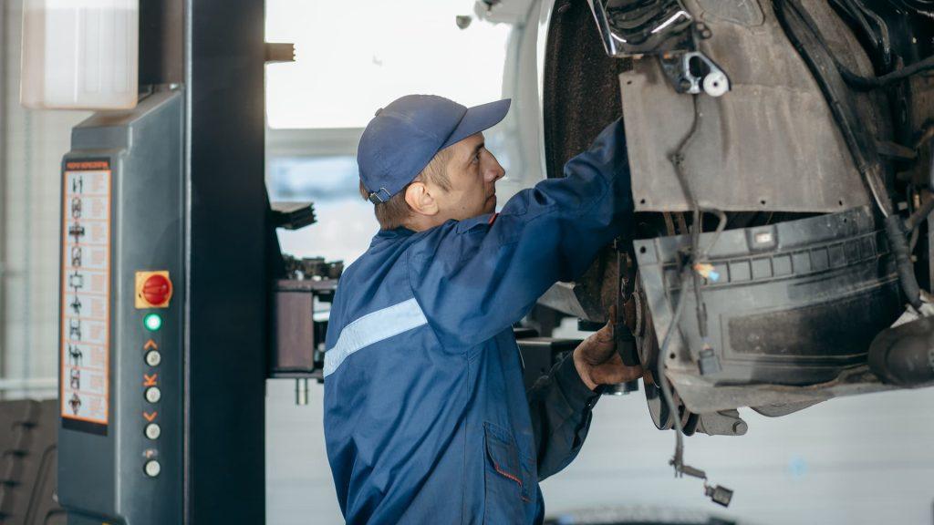 Mechanic checking a car