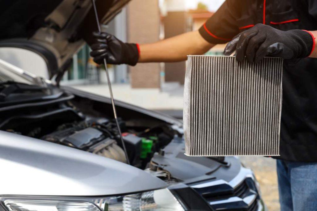 Car Being Serviced By Mechanic