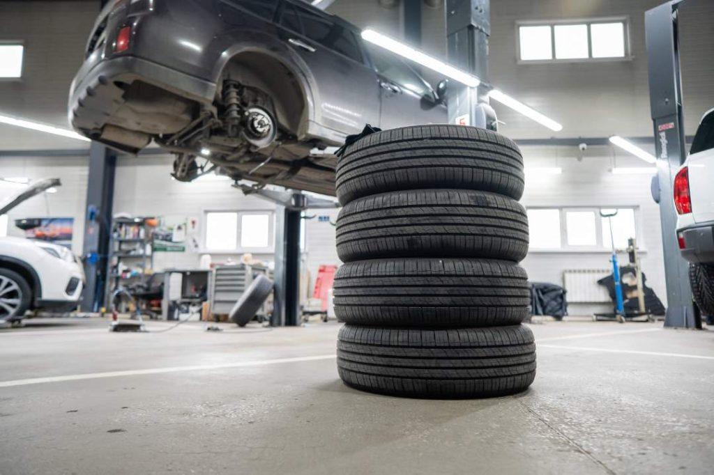 Stacks Of New Tyres In Garage